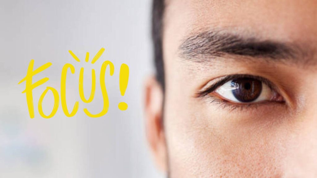 Close-up of a person with 'Focus' written next to them
