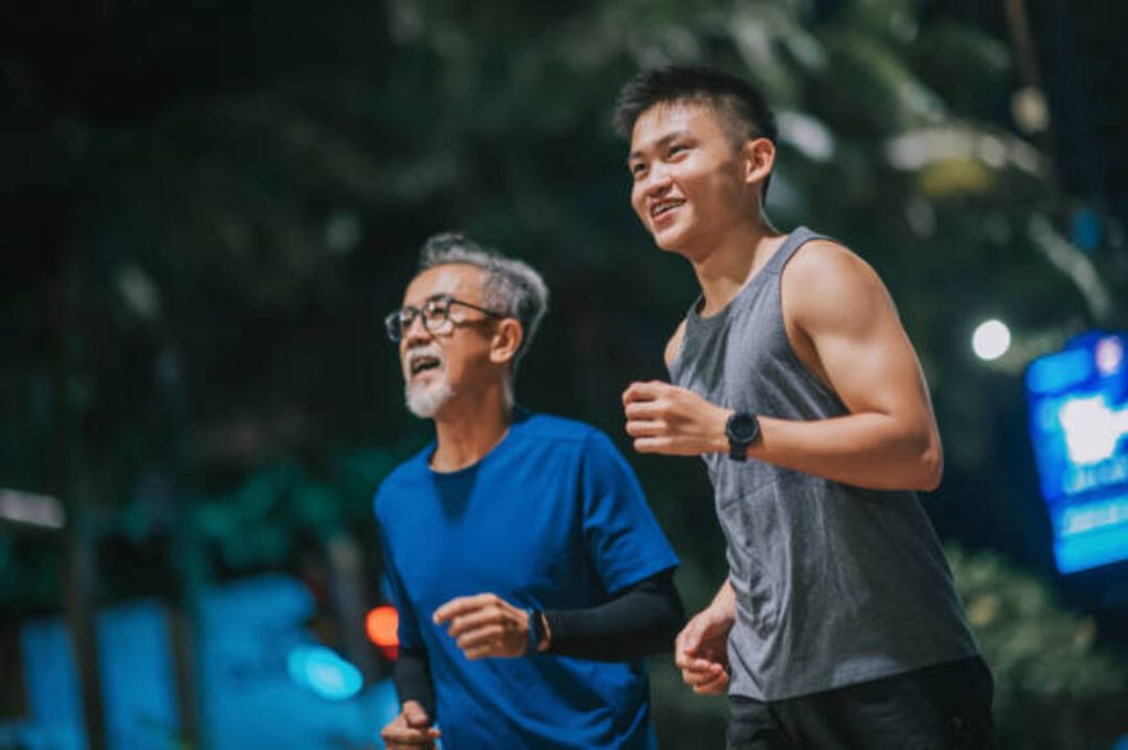 Two people jogging to maintain a healthy weight and reduce snoring.